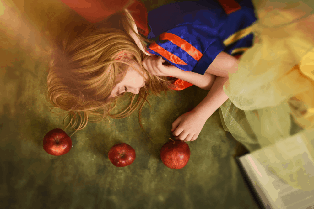 fairy tale princess with book and apples